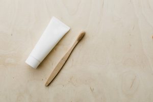 Image of tube and bamboo brush